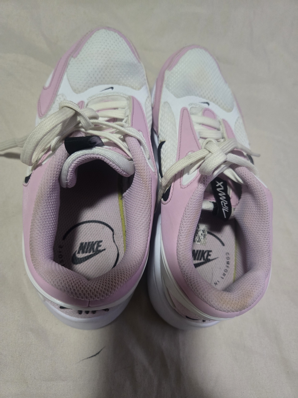 Nike Women’s Pink and White Running Sneakers